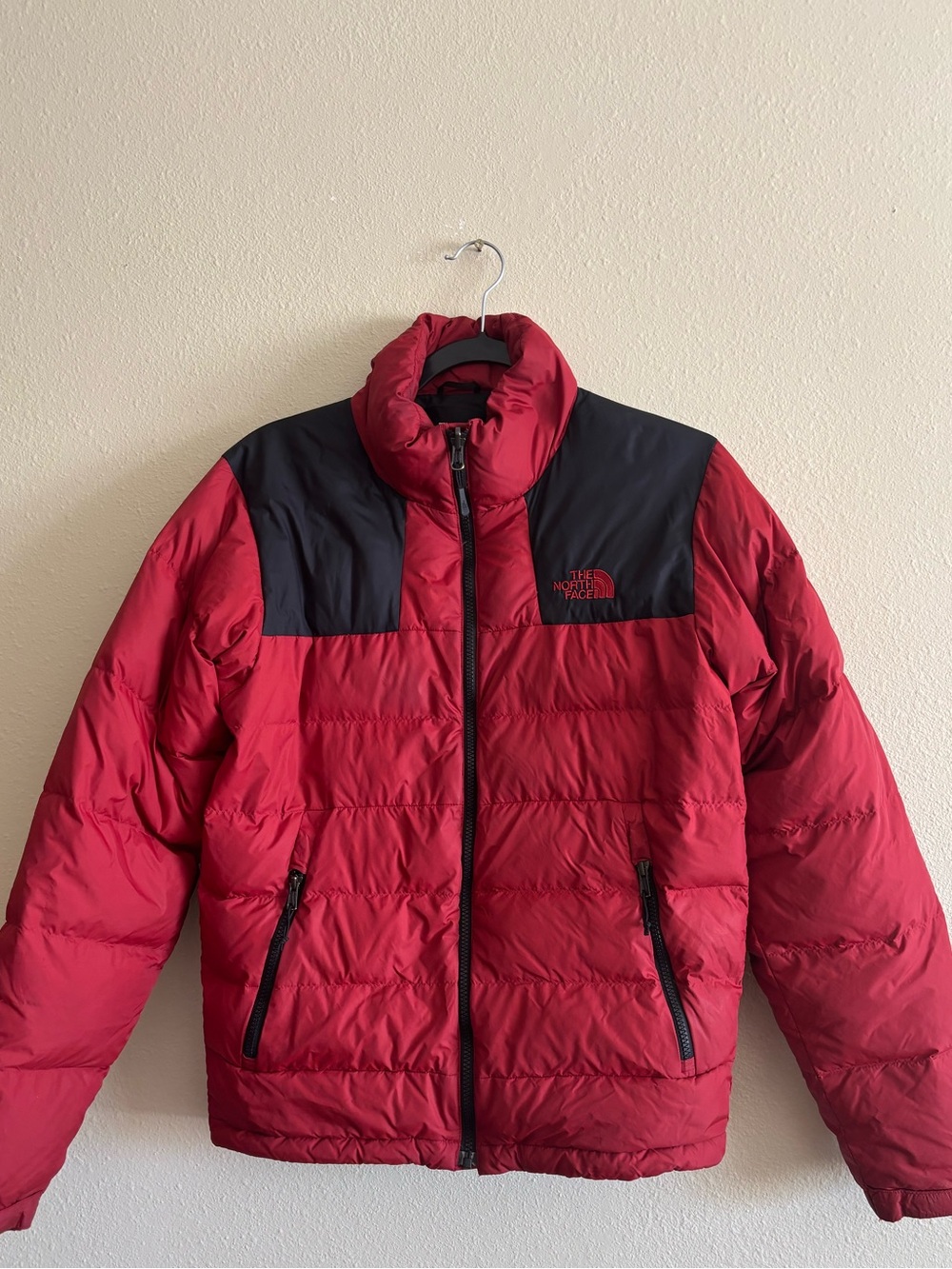 The North Face Red Puffer Jacket with Black Shoulder Yoke